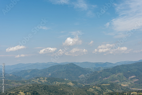 Fascinating panorama of sunset and landscape in the mountains on the hill, Ukrainian Carpathians mountains. Colored and their mountain landscapes. Nature concept