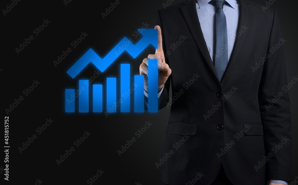 Businessman hold drawing on screen growing graph, arrow of positive growth icon.pointing at creative business chart with upward arrows.Financial, business growth concept Businessman hold drawing on screen growing graph, arrow of positive growth icon.pointing at creative business chart with upward arrows.Financial, business growth concept