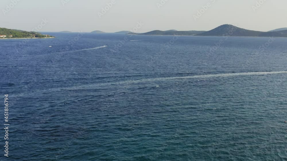 Aerial view of The Adriatic Sea with a boat and the island Aerial view of The Adriatic Sea with a boat and the island