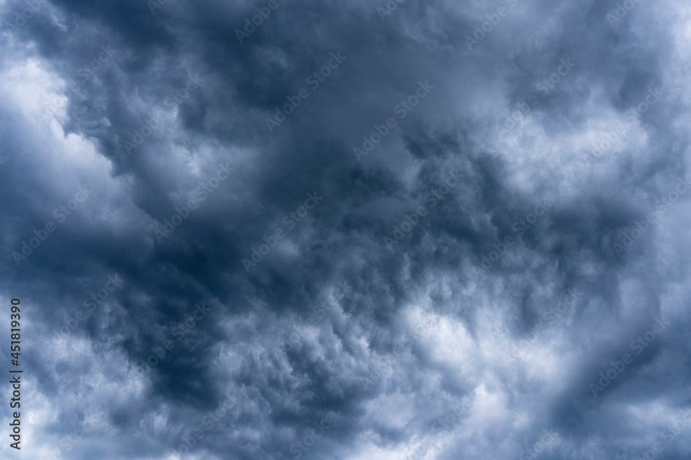 Dramatic stormy sky with beautiful cloud at sundown before the rain Dramatic stormy sky with beautiful cloud at sundown before the rain