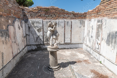 Archaeological excavations of Ostia Antica with the domus of Amore and Psiche and the romantic passion of love depicting in the marble statue - Rome photo