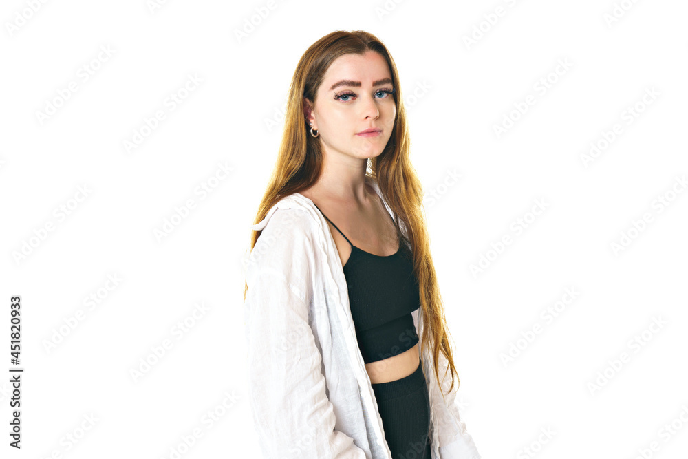 Portrait of young beautiful and cheerful girl looking at camera over white background. Portrait of young beautiful and cheerful girl looking at camera over white background.