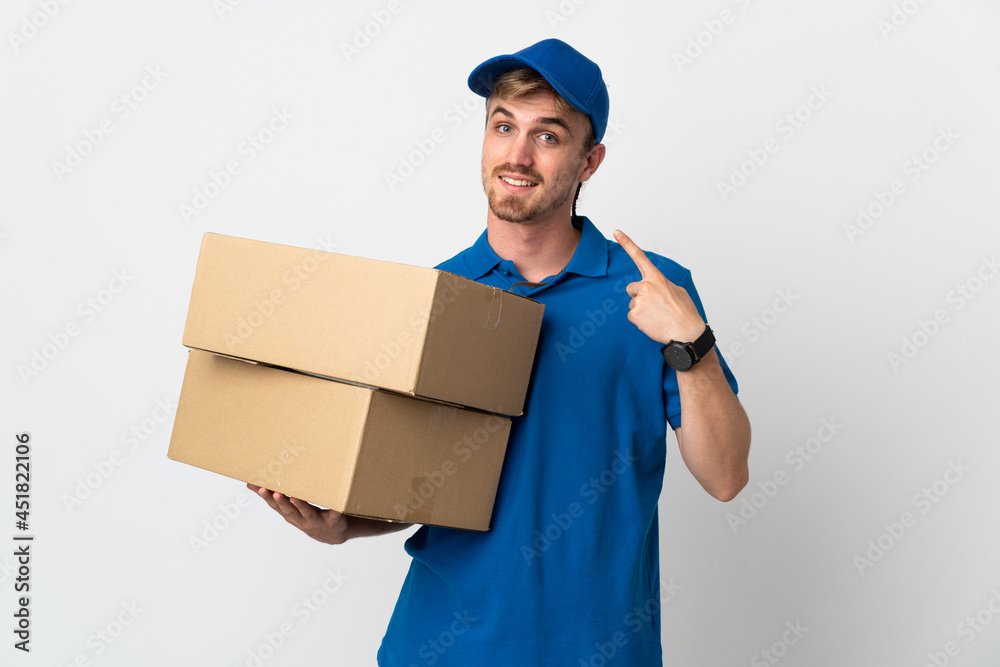 Young delivery blonde man isolated on white background giving a thumbs up gesture Young delivery blonde man isolated on white background giving a thumbs up gesture