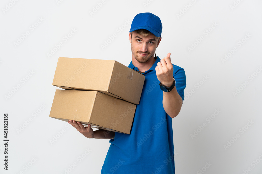 Young delivery blonde man isolated on white background making money gesture Young delivery blonde man isolated on white background making money gesture