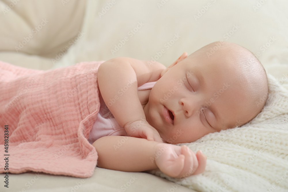 Cute little baby sleeping on blanket at home Cute little baby sleeping on blanket at home