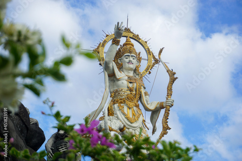 Denpasar, Bali, Indonesia (1 August 2021): Landmark of Denpasar city. City Park "Titi Banda Statue". Ramayana folklore.