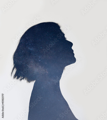 Double exposure woman with universe