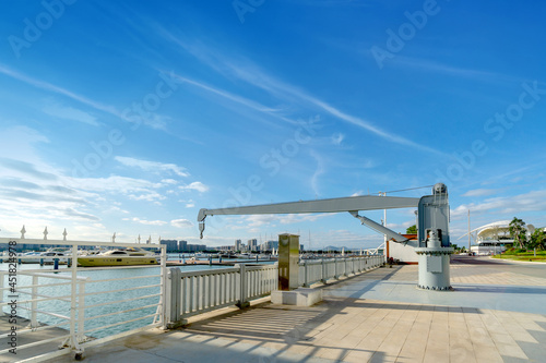 single boom crane on the dock