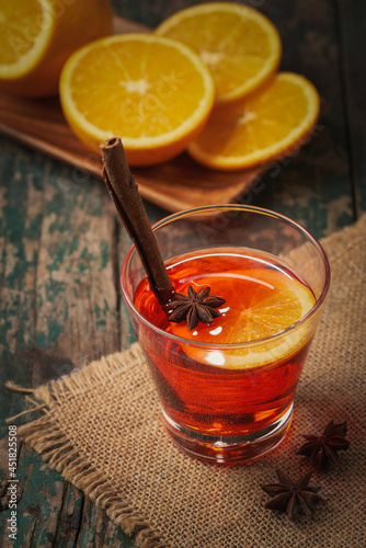 Christmas mulled wine on a rustic wooden table. Holidays concept.