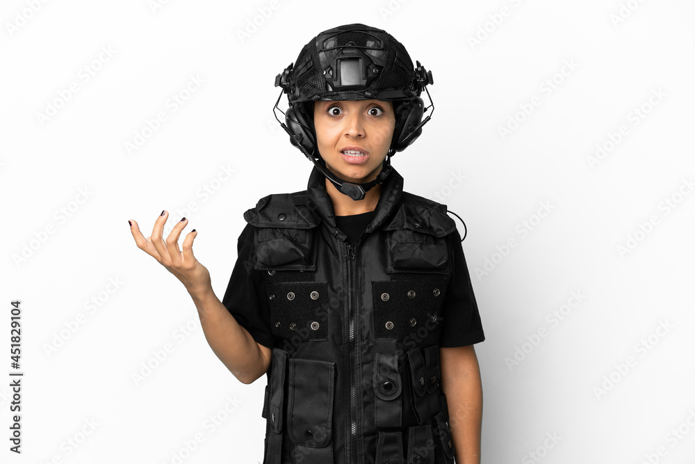 SWAT woman isolated on white background making doubts gesture SWAT woman isolated on white background making doubts gesture
