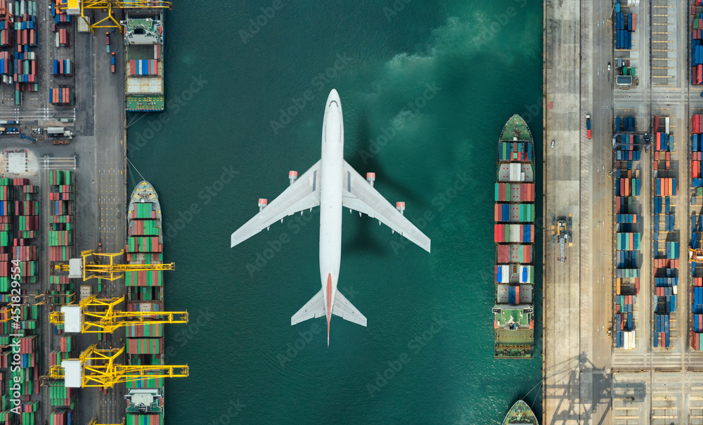 Container ship in export and import business and logistics. Shipping cargo to harbor by crane. Water transport International. Aerial view and top view.
Container ship in export and import business and logistics. Shipping cargo to harbor by crane. Water transport International. Aerial view and top view.