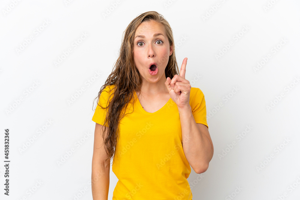 Young caucasian woman isolated on white background intending to realizes the solution while lifting a finger up Young caucasian woman isolated on white background intending to realizes the solution while lifting a finger up
