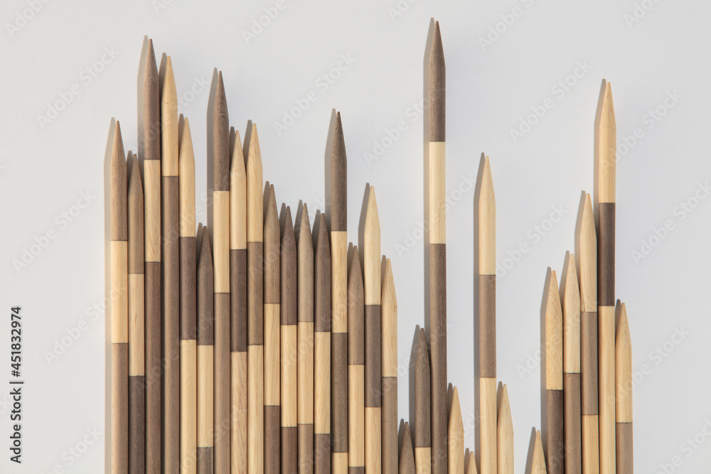 Japanese Board game Mikado. Bamboo sticks from the game on a white background. Top view, macro