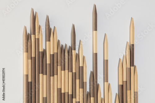 Japanese Board game Mikado. Bamboo sticks from the game on a white background. Top view  macro