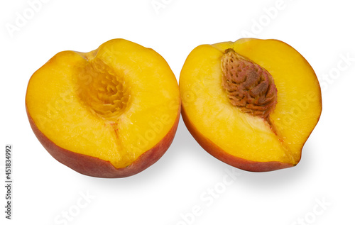 Whole peach and sliced isolated on a white background.Bright, fresh fruits on a white background.Use for labels, posters and web design.