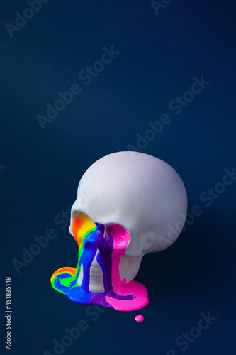 Skull with vivid paint. Spooky concept. Halloween or Santa Muerte concept. Retro future background.