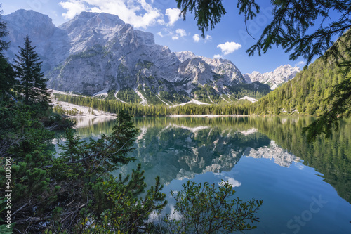 Pragser Wildsee and reflected mountains in the Dolomites in Italy