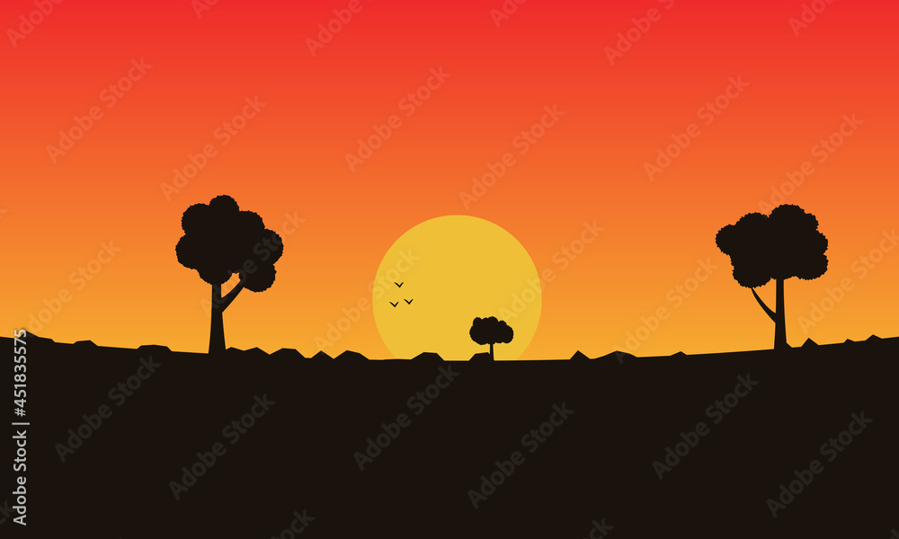 silhouette of a tree in sunset landscape