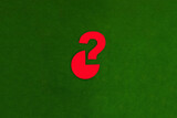 A circle, a red question mark on a green background. The concept of determining the share. Segment.