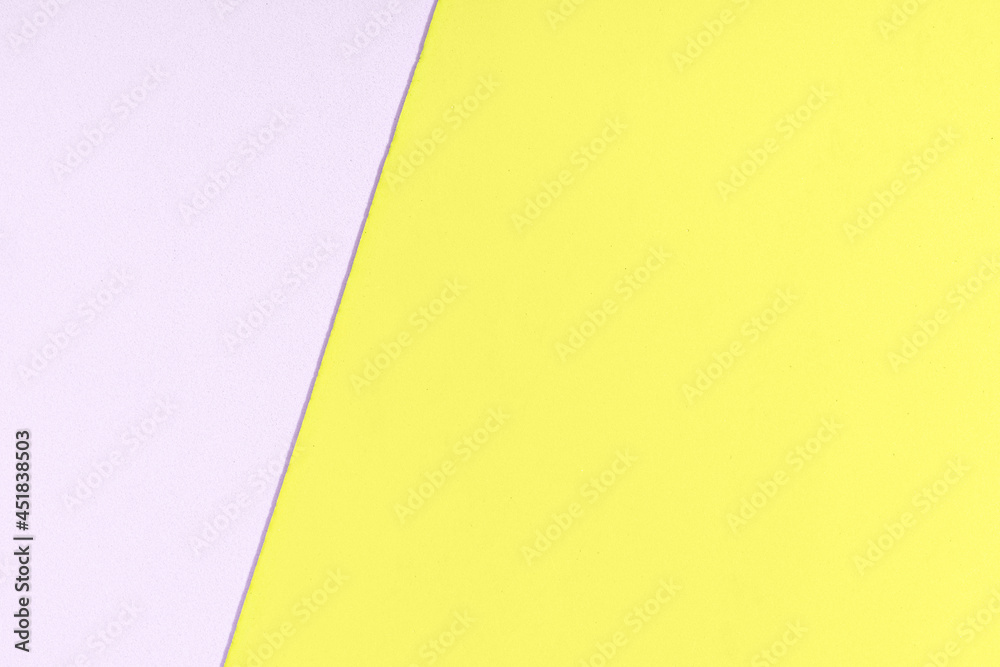 Yellow and purple foam sheet with diagonal texture background. Full frame Yellow and purple foam sheet with diagonal texture background. Full frame