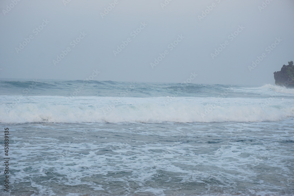 Mesra beach with a natural background. Mesra means intimate. Mesra beach also known as kukup beach or ngrawe beach