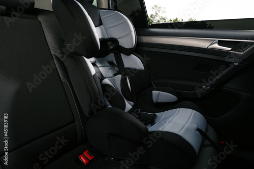 Empty modern child safety seat in car