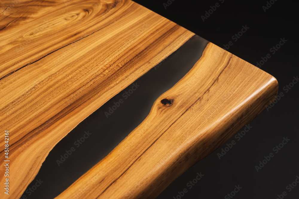 Style wooden slab, saw cut wood treated with varnish close-up on black. Isolate. Style wooden slab, saw cut wood treated with varnish close-up on black. Isolate.