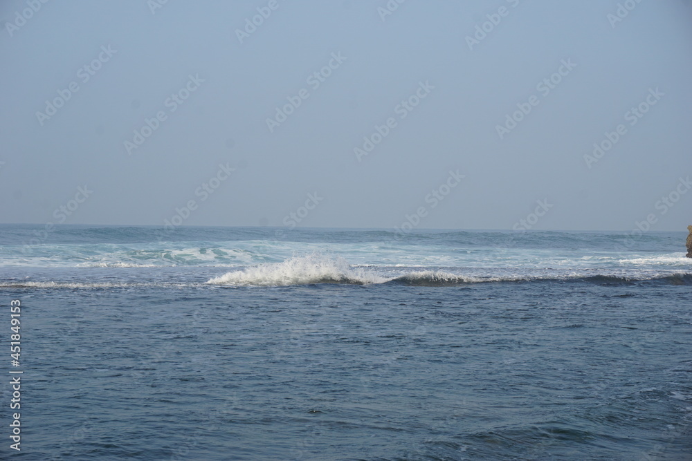 Mesra beach with a natural background. Mesra means intimate. Mesra beach also known as kukup beach or ngrawe beach