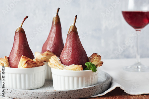 Poached pears in red wine.