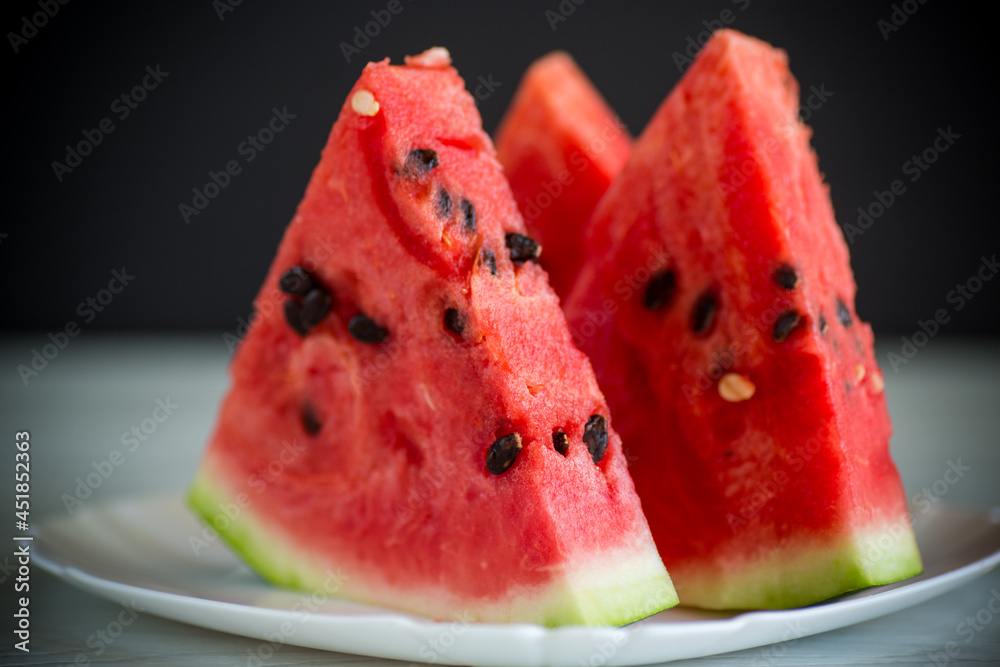 pieces of fresh ripe red watermelon on table pieces of fresh ripe red watermelon on table