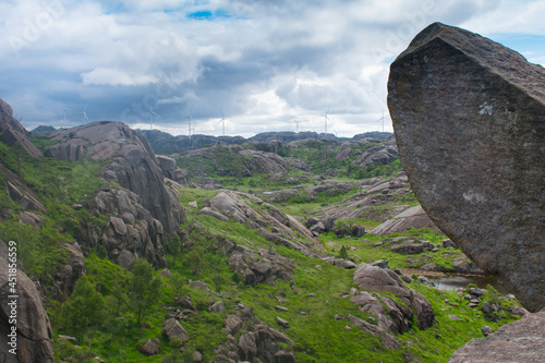 Trollpikken hike in Europe (Norway) with Windmills over rural mountains in  - Green Future concept photo