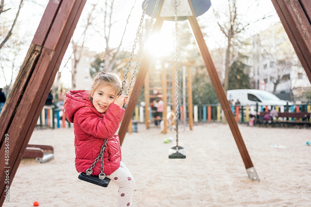 Portrait of a kid in the swing Portrait of a kid in the swing