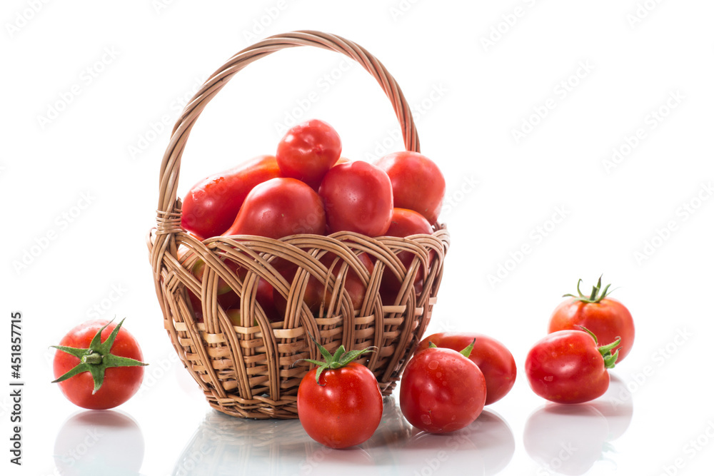 fresh ripe red tomatoes in basket isolated on white fresh ripe red tomatoes in basket isolated on white