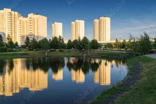 Summer sunset view of Yuzhnoe Butovo park in South Butovo district  Moscow  Russia.