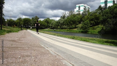 Wallpaper Mural Adult woman running in the park Torontodigital.ca