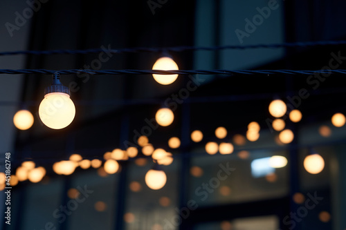 Blurred Christmas lights in the night © Andrius