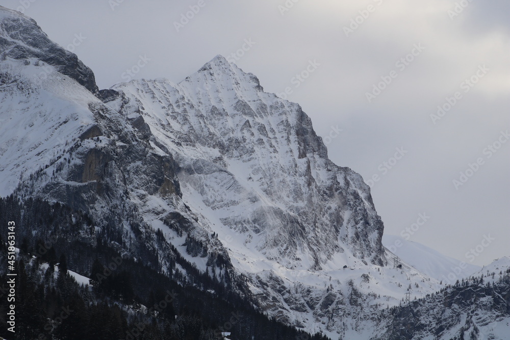 Peak of Mount Arpelistock in winter, Swiss Alps.