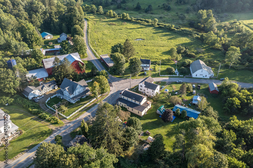 Fototapeta Naklejka Na Ścianę i Meble -  Aerial view of Starrucca Pennsylvania in Waybe county a historic borough along the New York state border consisting of 2 small streets rural village in the valley with a barn, inn, post office