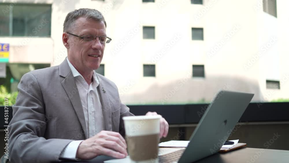 professional businessman working with laptop in the morning, outdoor working space in the city downtown, day starting work with business team, online connection cyberspace with the smart device professional businessman working with laptop in the morning, outdoor working space in the city downtown, day starting work with business team, online connection cyberspace with the smart device