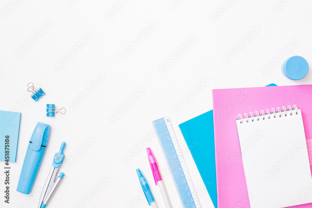 Flat lay frame with school and office supplies on a white background Flat lay frame with school and office supplies on a white background