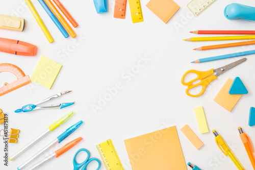 Flat lay school and office supplies on a white background