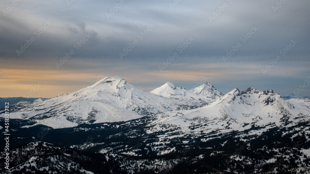 Three Sisters Mountains in the Oregon Cascades from a helicopter Three Sisters Mountains in the Oregon Cascades from a helicopter