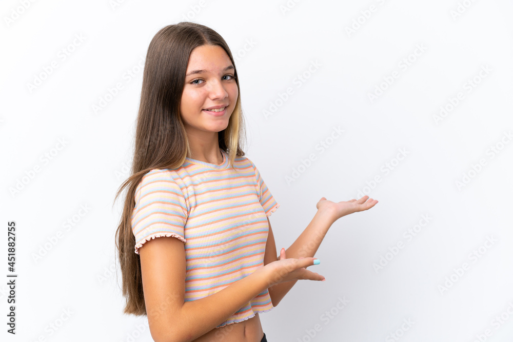 Little caucasian girl isolated on white background extending hands to the side for inviting to come Little caucasian girl isolated on white background extending hands to the side for inviting to come