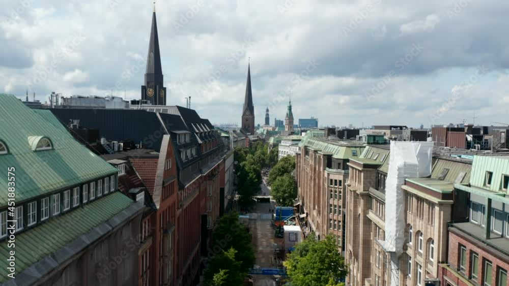 Descending shot of historic city centre with known landmarks, churches and old buildings. Free and Hanseatic City of Hamburg, Germany Descending shot of historic city centre with known landmarks, churches and old buildings. Free and Hanseatic City of Hamburg, Germany