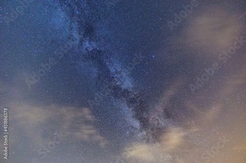milky way on a partly cloudy sky
