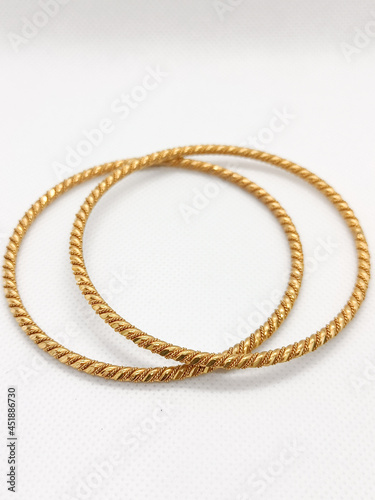 Close Up Gold Bangle isolated With White Background
