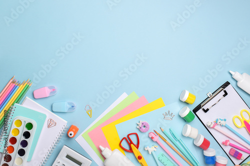 Flat lay office supplies. Various stationery on a light blue background