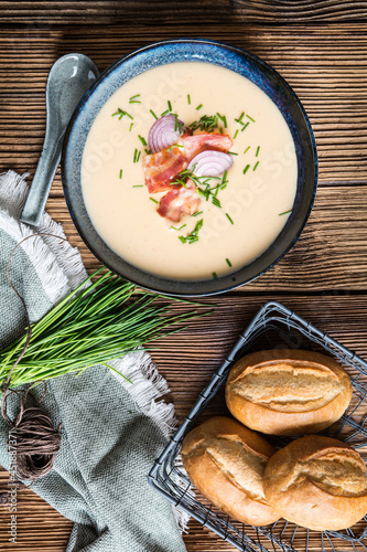 Demikat, classic Slovakian creamy sheep cheese soup topped with roasted bacon and fresh chives