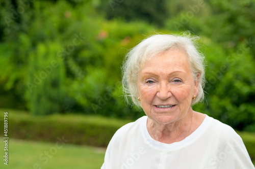 Portrait of a smiling attractive senior lady in her eighties