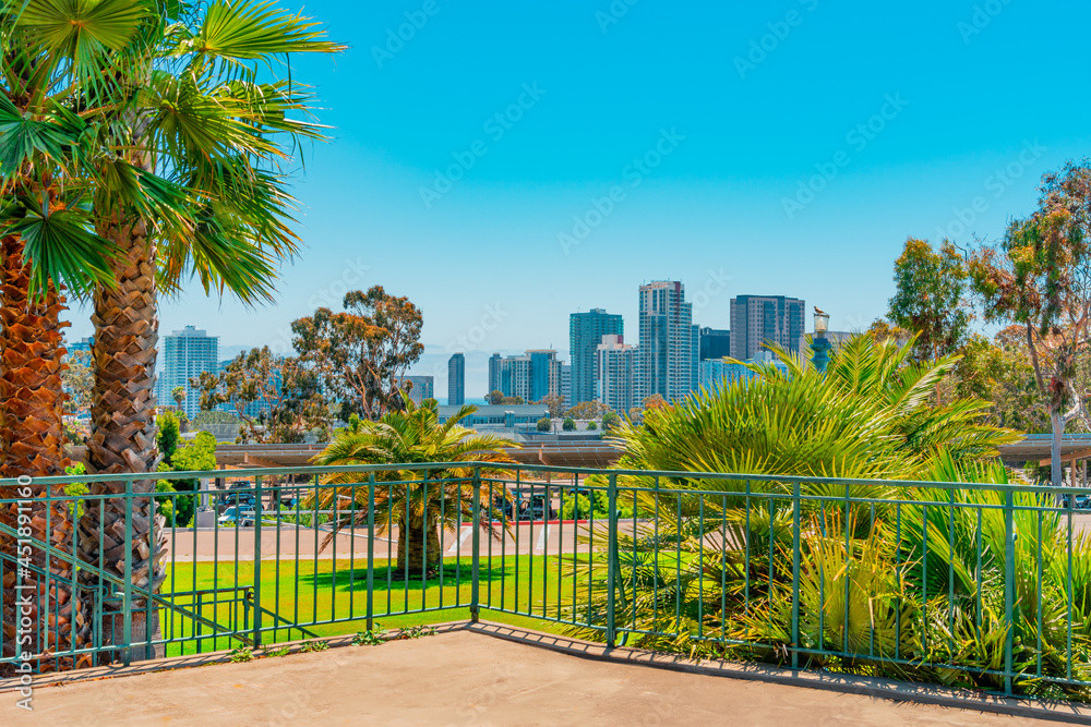 Balboa Parks patios and lush landscape lead to  the  San Diego skyline in Southern California.